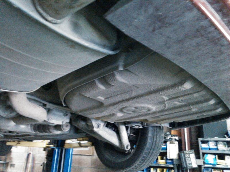 Illustration for article titled When you really, truly have to have a center exhaust on your E39